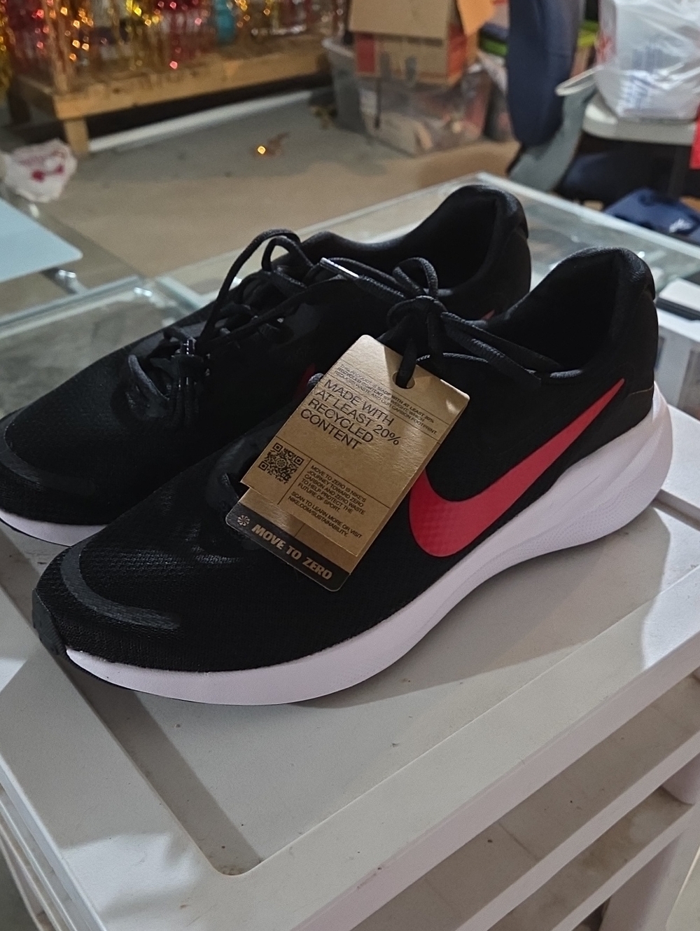 Nike Men's Black Running Shoes with Red Swoosh